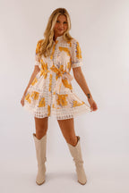 Light blue mini dress with lace trim and puff sleeves, featuring a playful and feminine style. 1