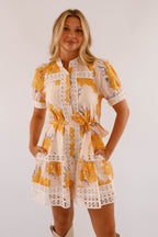 Light blue mini dress with lace trim and puff sleeves, featuring a playful and feminine style. 3
