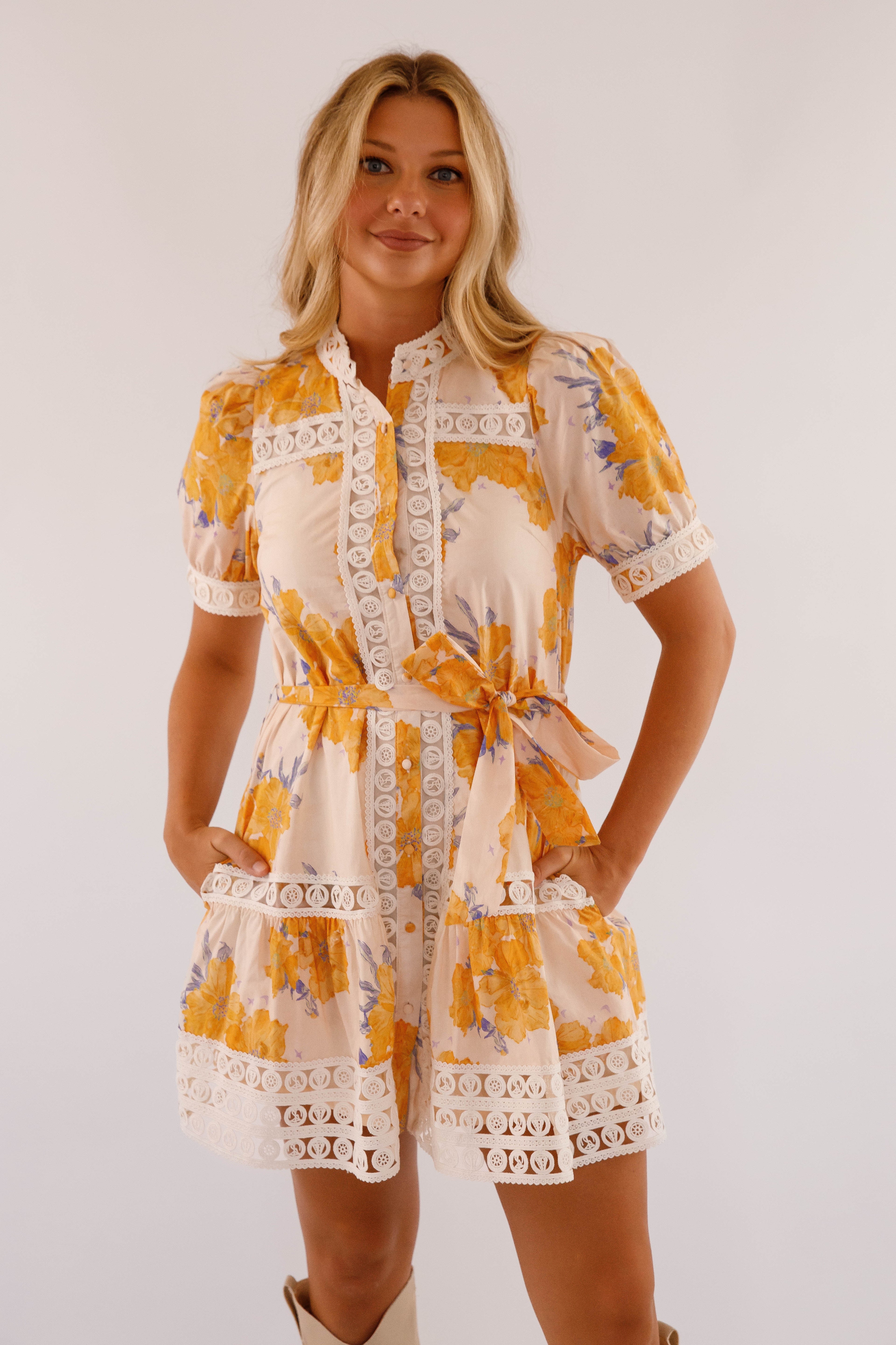 Light blue mini dress with lace trim and puff sleeves, featuring a playful and feminine style. 3