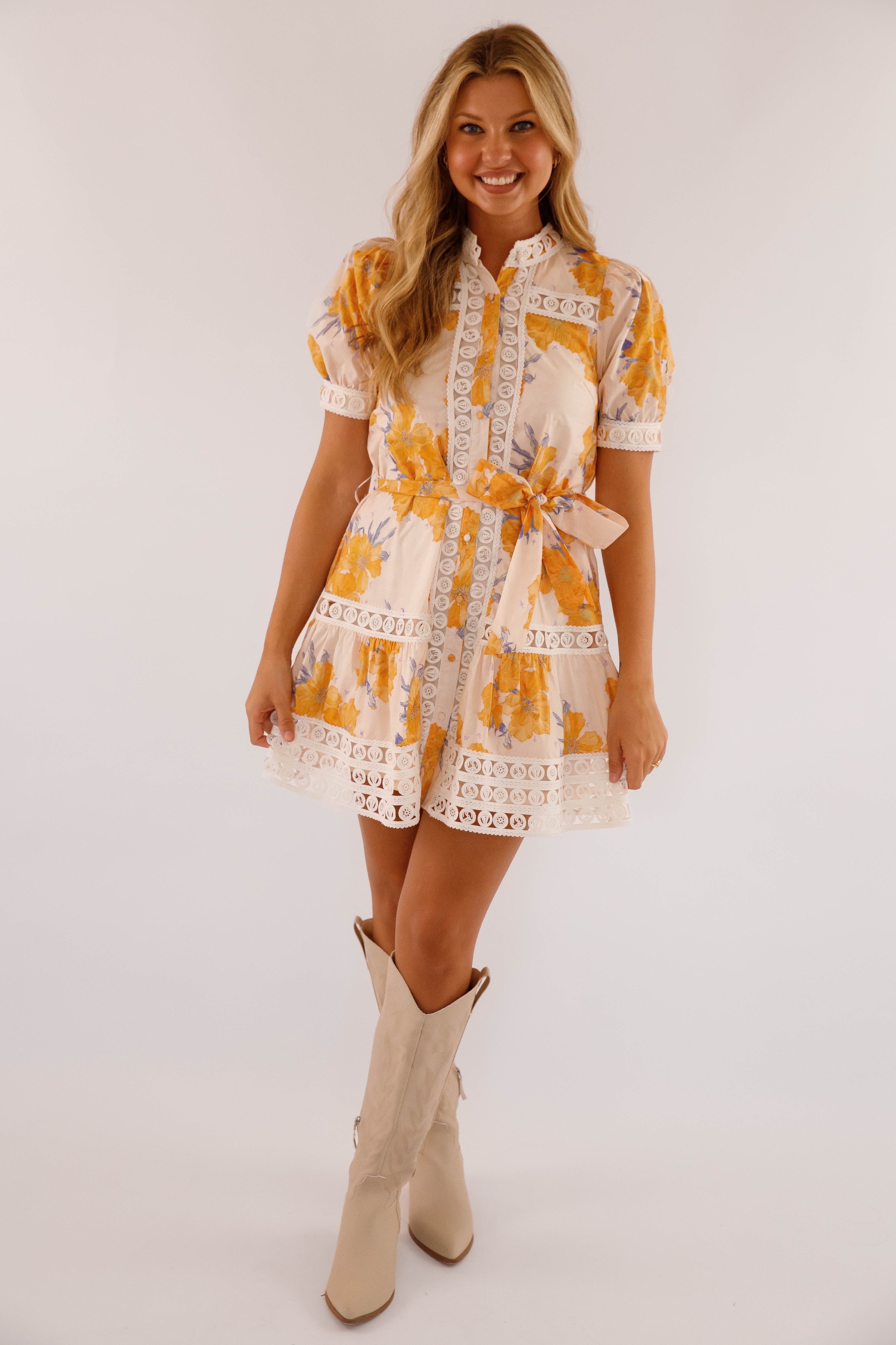 Light blue mini dress with lace trim and puff sleeves, featuring a playful and feminine style. 6