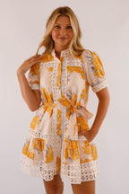 Light blue mini dress with lace trim and puff sleeves, featuring a playful and feminine style. 7