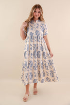 A blue tiered midi dress with a relaxed fit, featuring a wavy pattern perfect for casual summer outings. 5