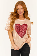 Rose gold sequin top with short sleeves and boatneck, featuring a chic and stylish design. 0
