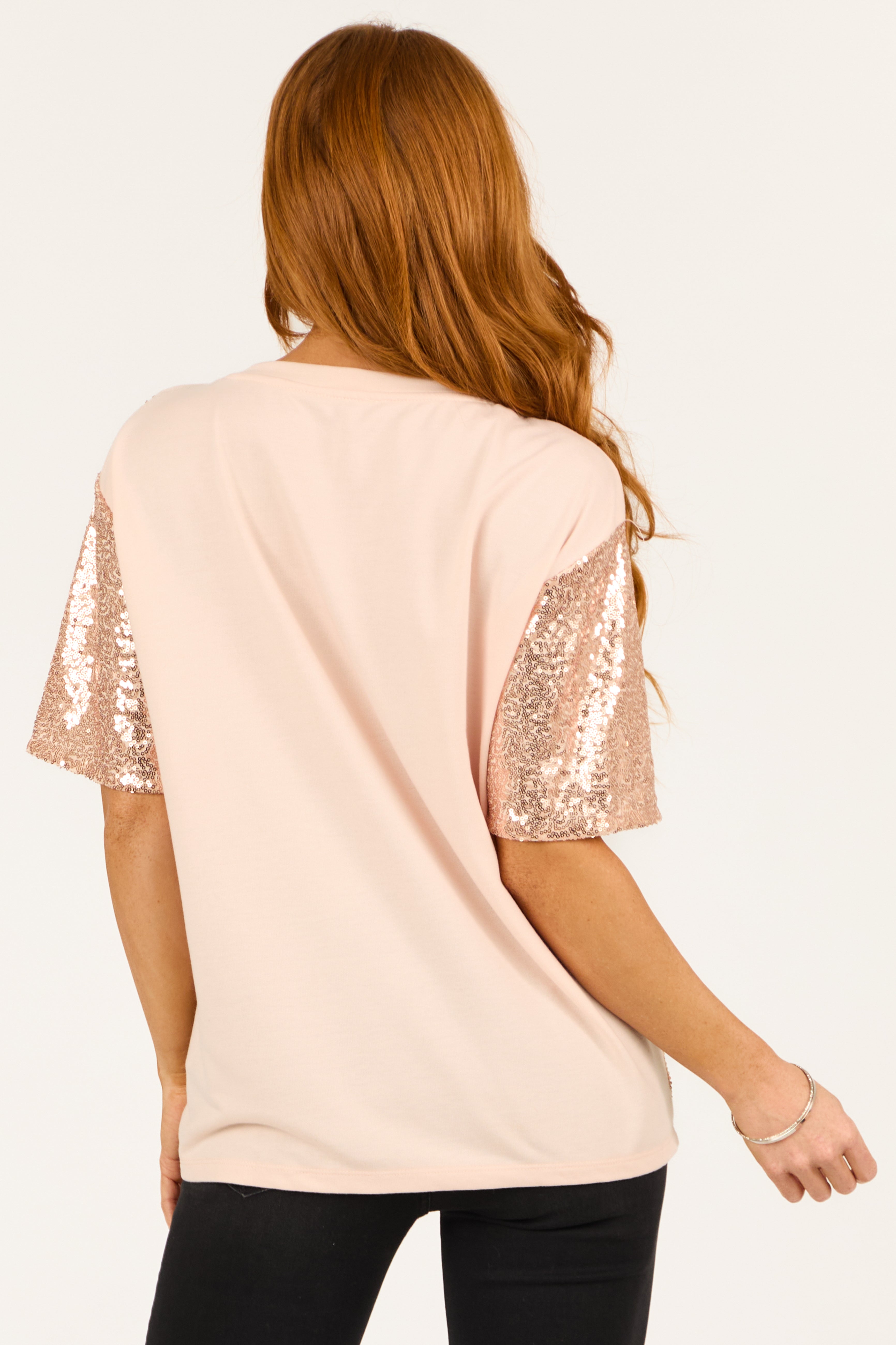 Rose gold sequin top with short sleeves and boatneck, featuring a chic and stylish design. 5
