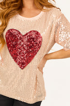 Rose gold sequin top with short sleeves and boatneck, featuring a chic and stylish design. 6