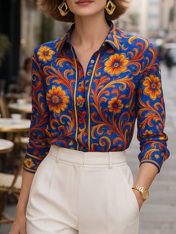 Floral print long sleeve blouse in soft cream with buttoned lapel, featuring a relaxed and feminine style. 0