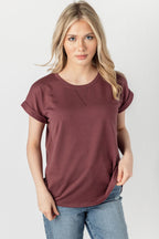 Light gray short sleeve sweatshirt with a relaxed fit and side slits, offering a casual and comfortable style. 0
