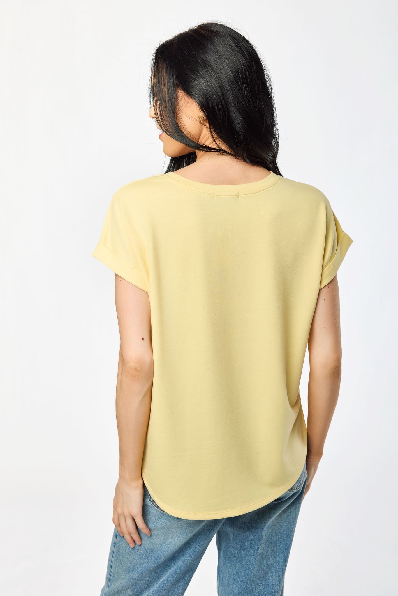 Light gray short sleeve sweatshirt with a relaxed fit and side slits, offering a casual and comfortable style. 2