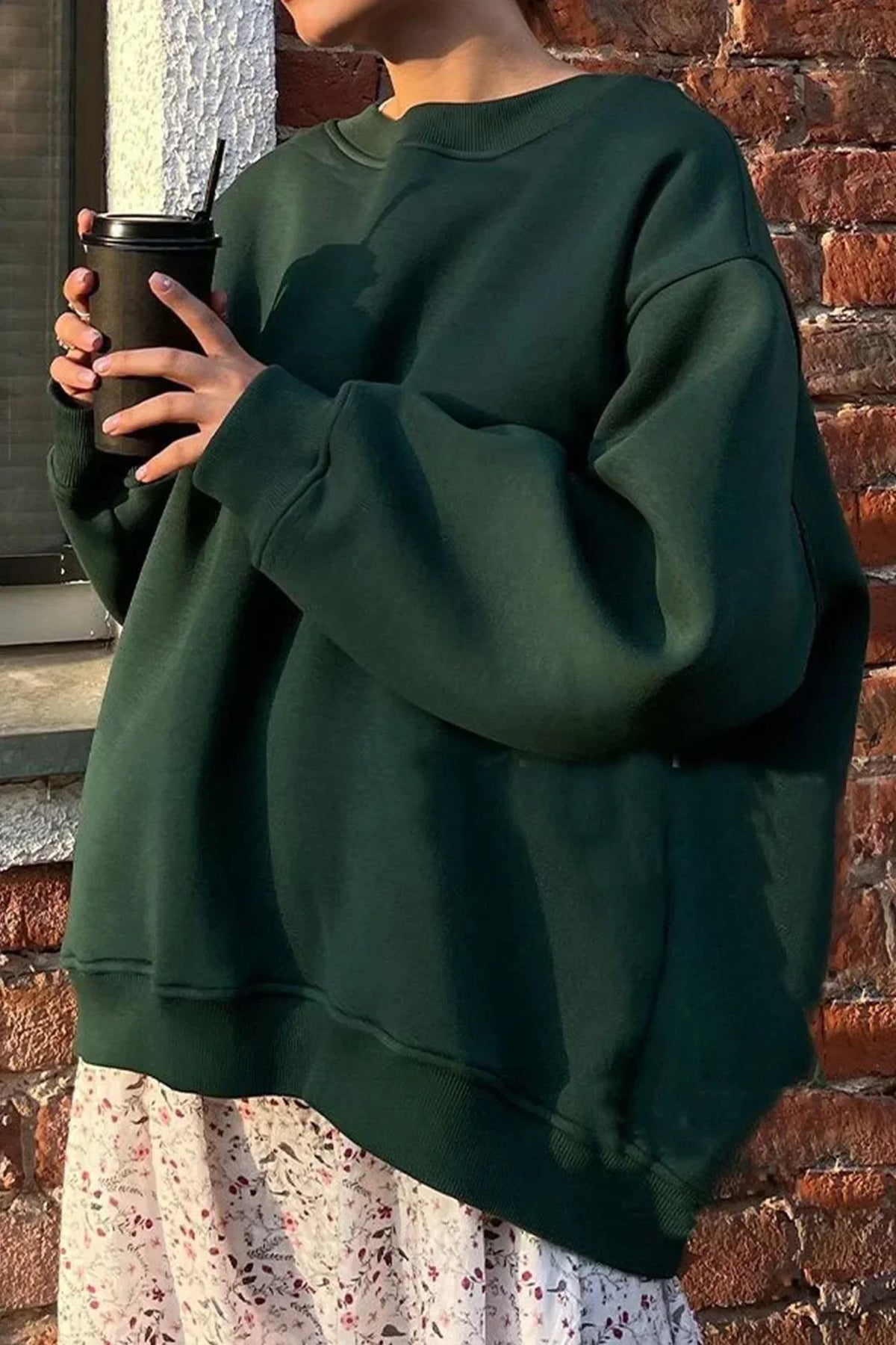 Marente oversized sweatshirt in dark green, worn front view