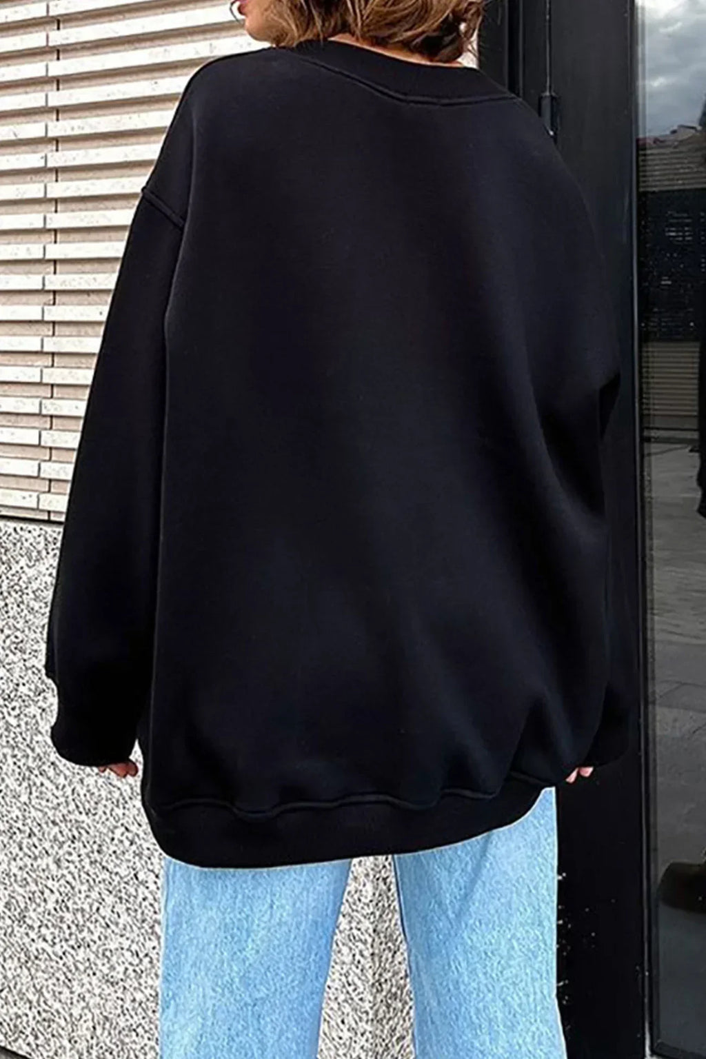 Marente oversized sweatshirt in black, back view