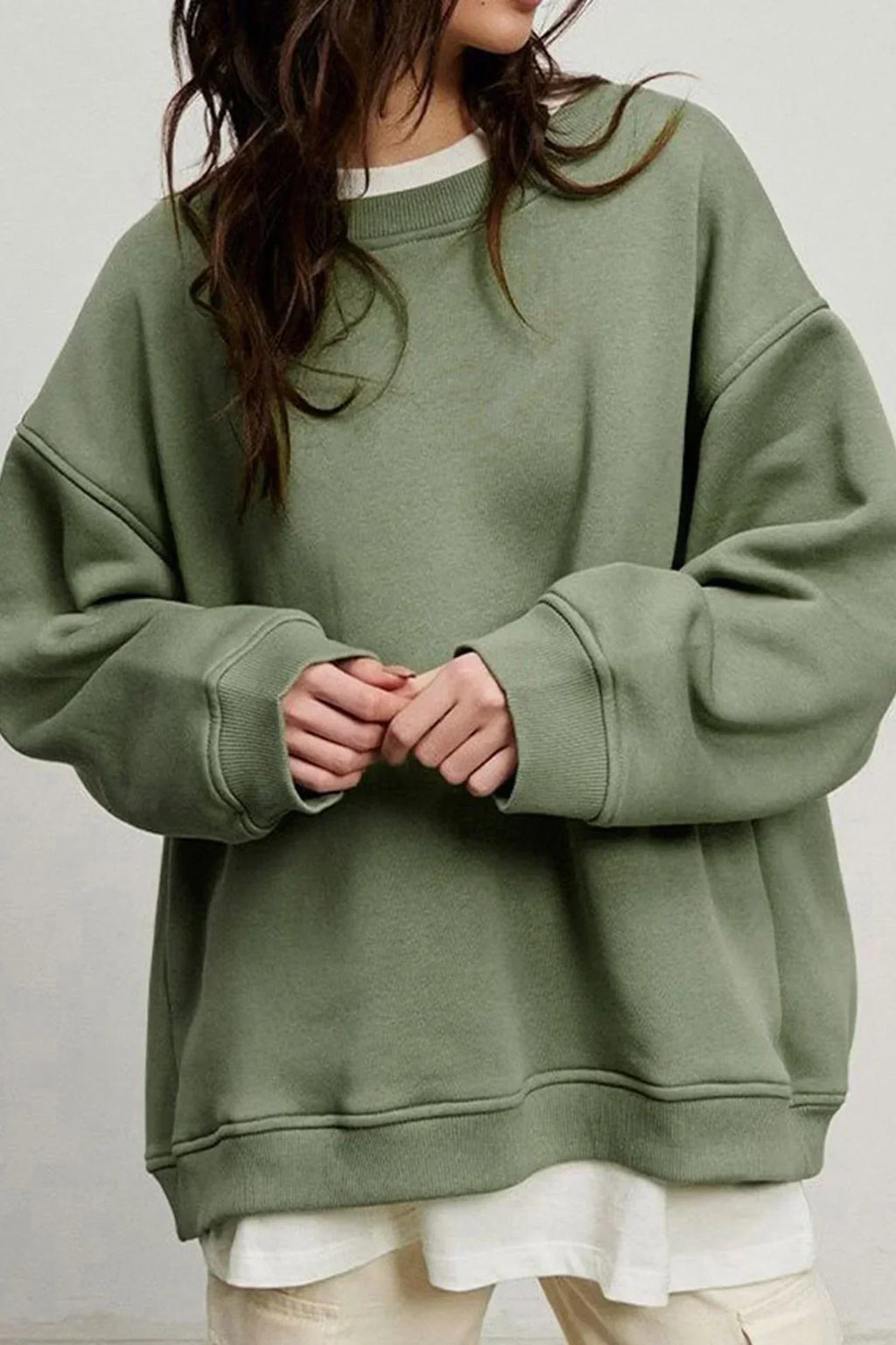 Marente oversized sweatshirt in olive green, worn front view