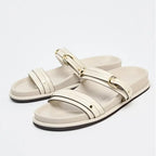 Black twin strap flats with a simple, minimalist design, perfect for casual or dressy occasions. 0