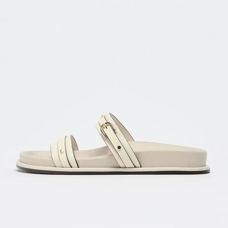 Black twin strap flats with a simple, minimalist design, perfect for casual or dressy occasions. 3