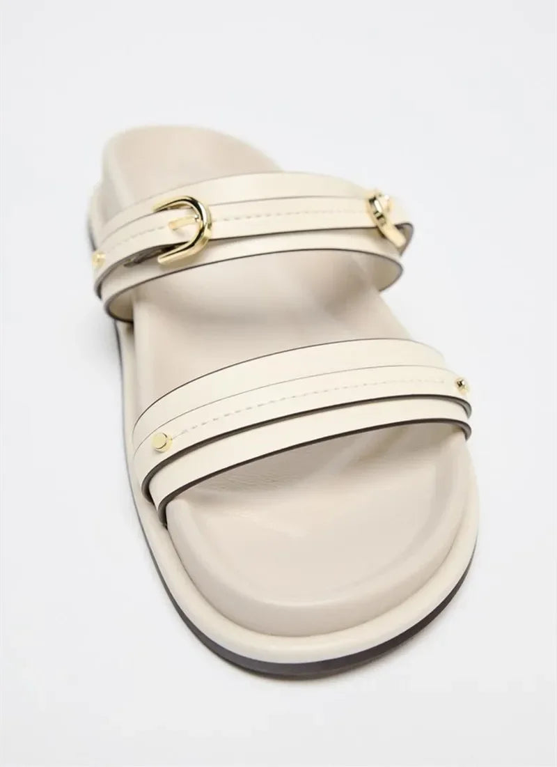 Black twin strap flats with a simple, minimalist design, perfect for casual or dressy occasions. 4
