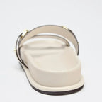 Black twin strap flats with a simple, minimalist design, perfect for casual or dressy occasions. 5