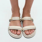 Black twin strap flats with a simple, minimalist design, perfect for casual or dressy occasions. 6