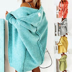 Loose knit oversized cardigan for women with a generous hood and longline cut.