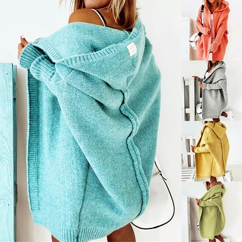 Loose knit oversized cardigan for women with a generous hood and longline cut.