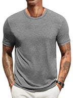 Lightweight crew neck t-shirt in a soft cotton blend, featuring a classic fit and a muted navy blue color. 7