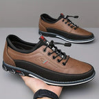 Black vegan leather Oxford shoes with a classic design, featuring a sleek and polished appearance. 5