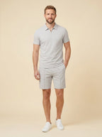 Men's summer set in navy blue, featuring a breathable zipper polo shirt and matching shorts in a casual style. 3