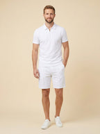 Men's summer set in navy blue, featuring a breathable zipper polo shirt and matching shorts in a casual style. 4