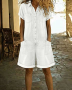 Light blue denim short sleeve jumpsuit with a relaxed fit and side pockets. Casual and comfortable style. 5
