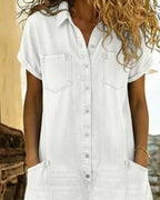 Light blue denim short sleeve jumpsuit with a relaxed fit and side pockets. Casual and comfortable style. 6