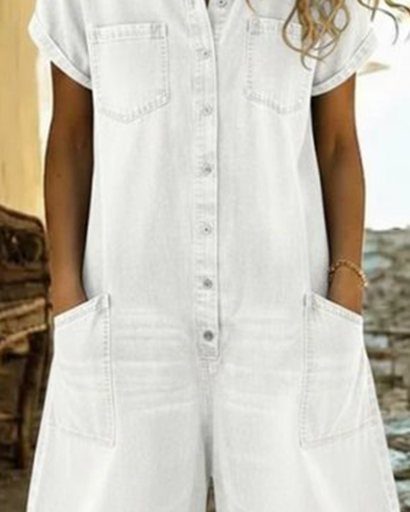 Light blue denim short sleeve jumpsuit with a relaxed fit and side pockets. Casual and comfortable style. 7