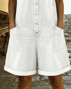 Light blue denim short sleeve jumpsuit with a relaxed fit and side pockets. Casual and comfortable style. 8