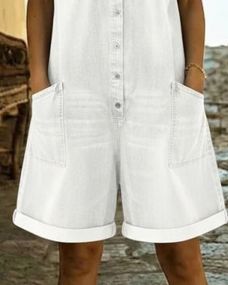 Light blue denim short sleeve jumpsuit with a relaxed fit and side pockets. Casual and comfortable style. 8