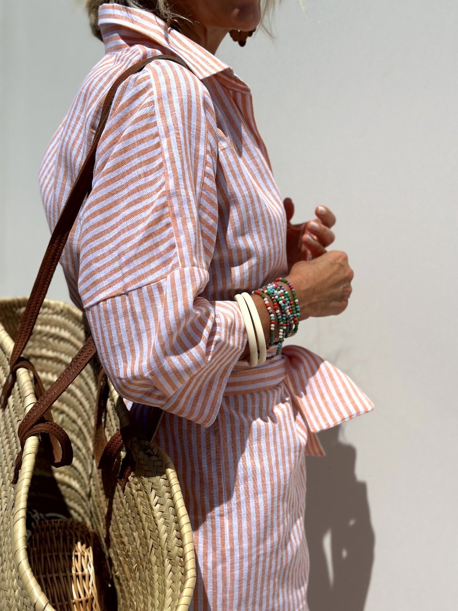 Mia striped shirt dress in soft fabric, featuring a button placket, with a blend of pastel colors and a casual style. 0