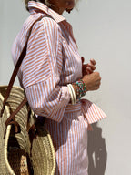 Mia striped shirt dress in soft fabric, featuring a button placket, with a blend of pastel colors and a casual style. 0