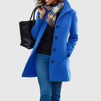 Monica tailored long coat with stand collar, blue, worn