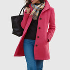 Monica tailored long coat with stand collar, pink, worn