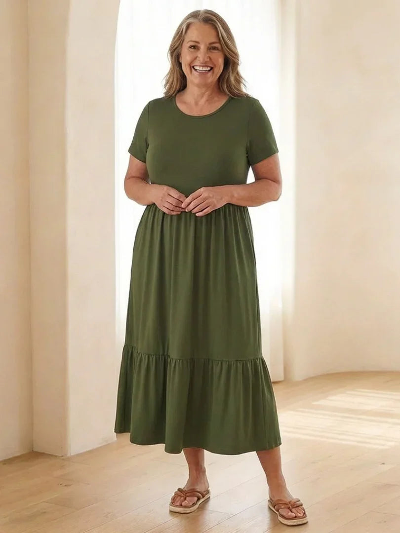 Nerissa round neck short sleeve tiered midi dress in soft blue cotton, featuring a relaxed fit and pockets. 5