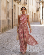 Elegant chic set in soft beige, featuring a sleek design with modern lines and delicate detailing. 0