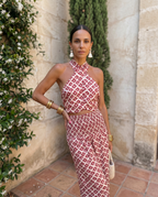 Elegant chic set in soft beige, featuring a sleek design with modern lines and delicate detailing. 1
