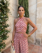 Elegant chic set in soft beige, featuring a sleek design with modern lines and delicate detailing. 2