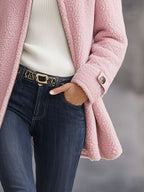 Ninthe teddy coat in pink, close-up of the front