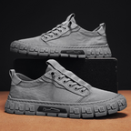 Men's classic lace-up sneakers in navy blue, featuring a minimalistic design and comfortable fit. 9