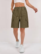 Olive green cargo shorts for women with a quick-dry fabric and multiple pockets, perfect for casual outdoor activities. 12