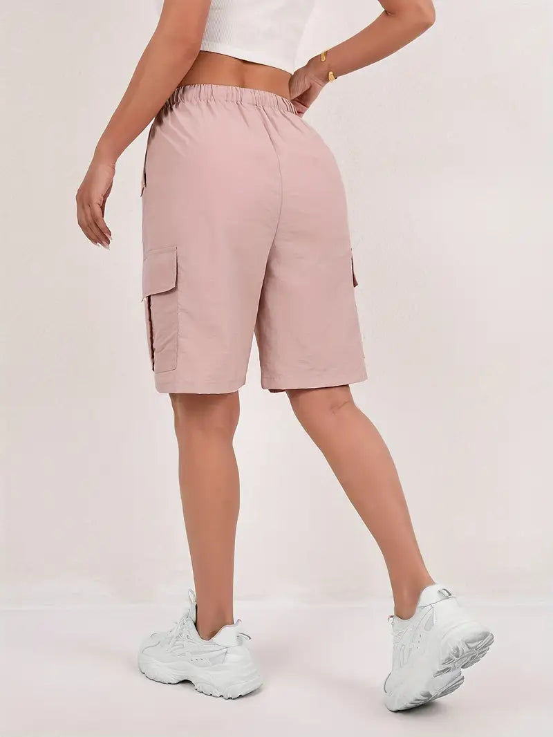 Olive green cargo shorts for women with a quick-dry fabric and multiple pockets, perfect for casual outdoor activities. 2