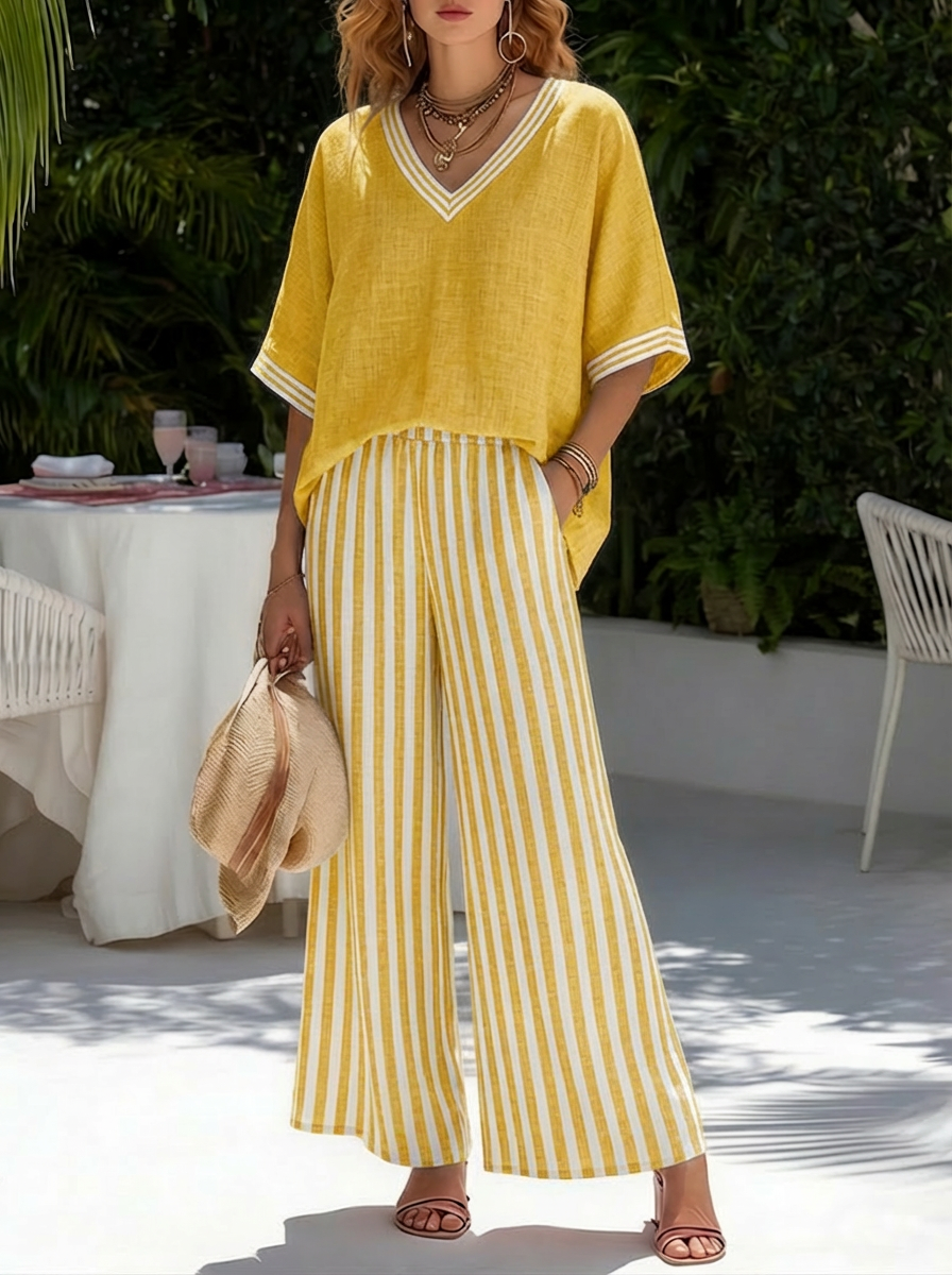 Lightweight two-piece co-ord set in pastel stripes, featuring a relaxed fit and casual style. 3