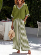 Lightweight two-piece co-ord set in pastel stripes, featuring a relaxed fit and casual style. 4