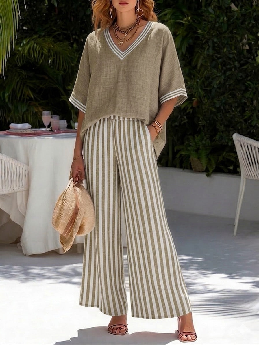 Lightweight two-piece co-ord set in pastel stripes, featuring a relaxed fit and casual style. 6