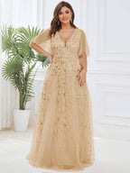 Plus size formal evening gown, navy blue, featuring ruffle sleeves and a floor-length silhouette. 12