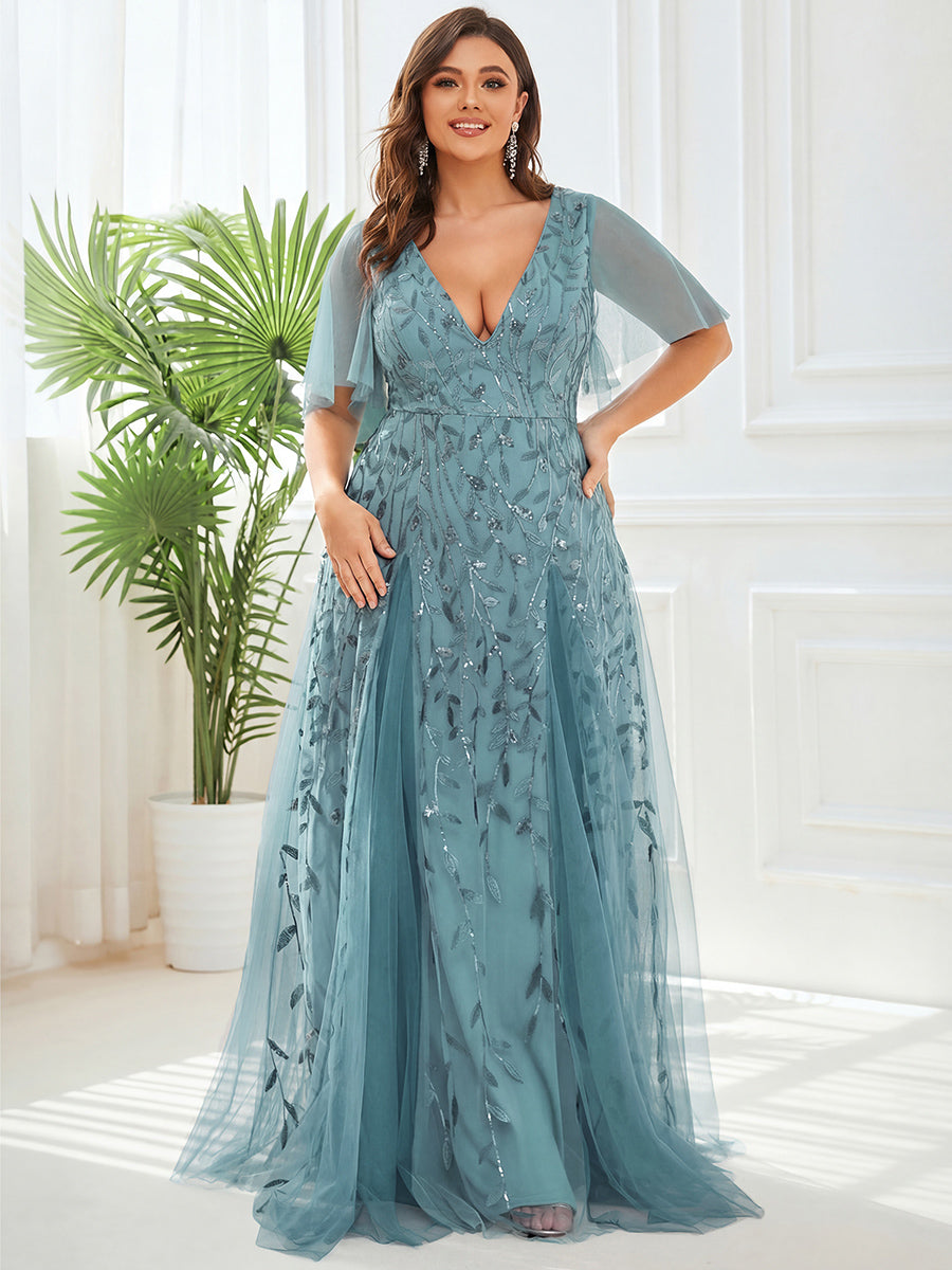 Plus size formal evening gown, navy blue, featuring ruffle sleeves and a floor-length silhouette. 15