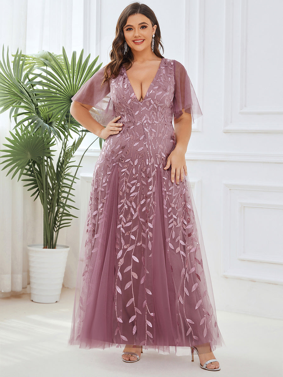 Plus size formal evening gown, navy blue, featuring ruffle sleeves and a floor-length silhouette. 16