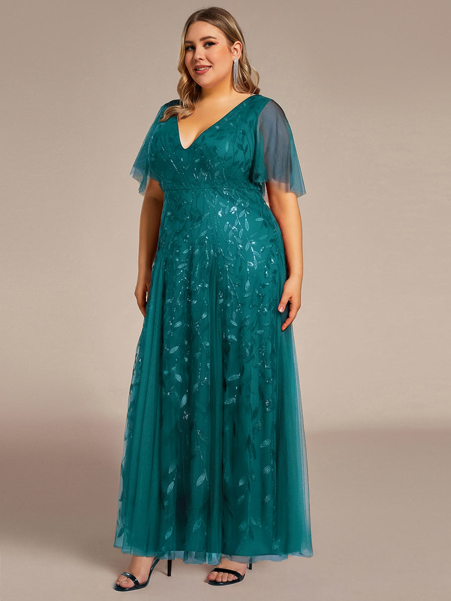 Plus size formal evening gown, navy blue, featuring ruffle sleeves and a floor-length silhouette. 18
